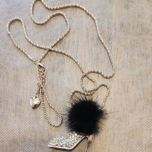 Betsey Johnson Gold and Black Necklace with Pom-Pom and Crystal Charms